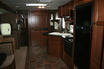 Kitchen and doors to bedroom